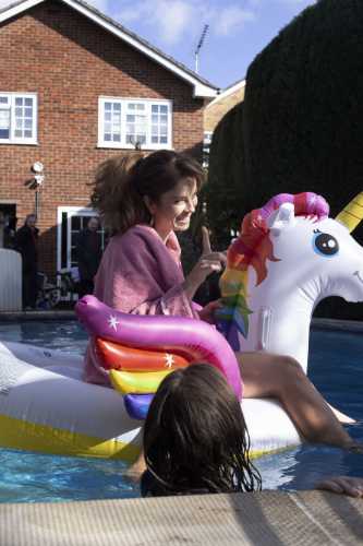 Elena on the  inflatable Unicorn